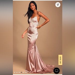 Pink evening gown. Dry cleaned after wearing once. Never hemmed. Like new.